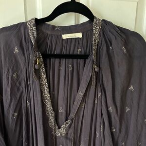 Loved and worn but in good condition.  Great beach cover up.